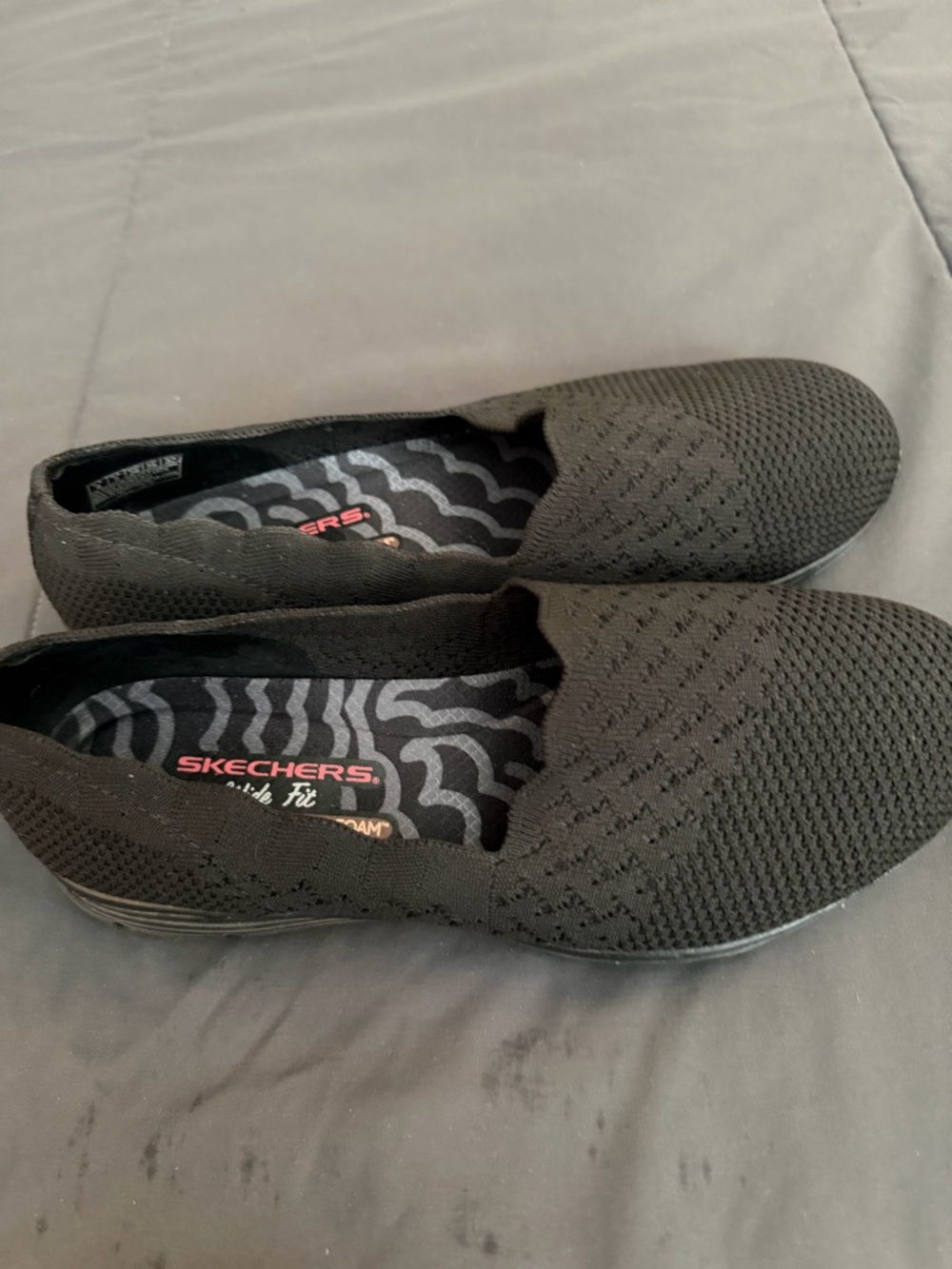 Skechers Black Slip-On Knit Loafers for Women
Size 8 Wide